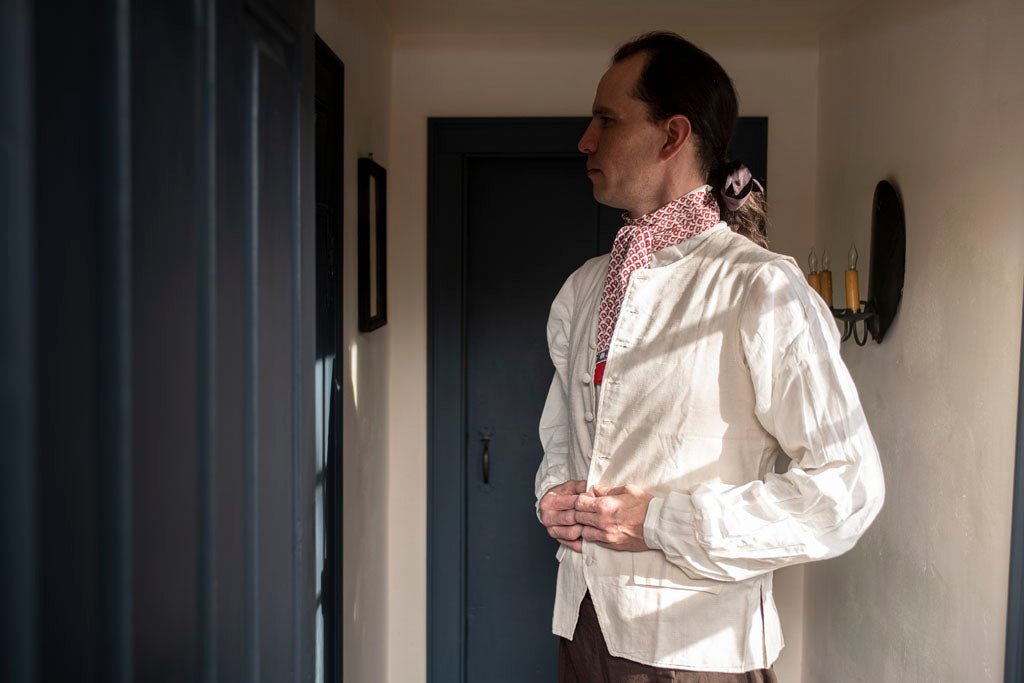 18th Century White Linen Waistcoat, appropriate for Revolutionary War Reenactments, being worn in a Colonial American Home.