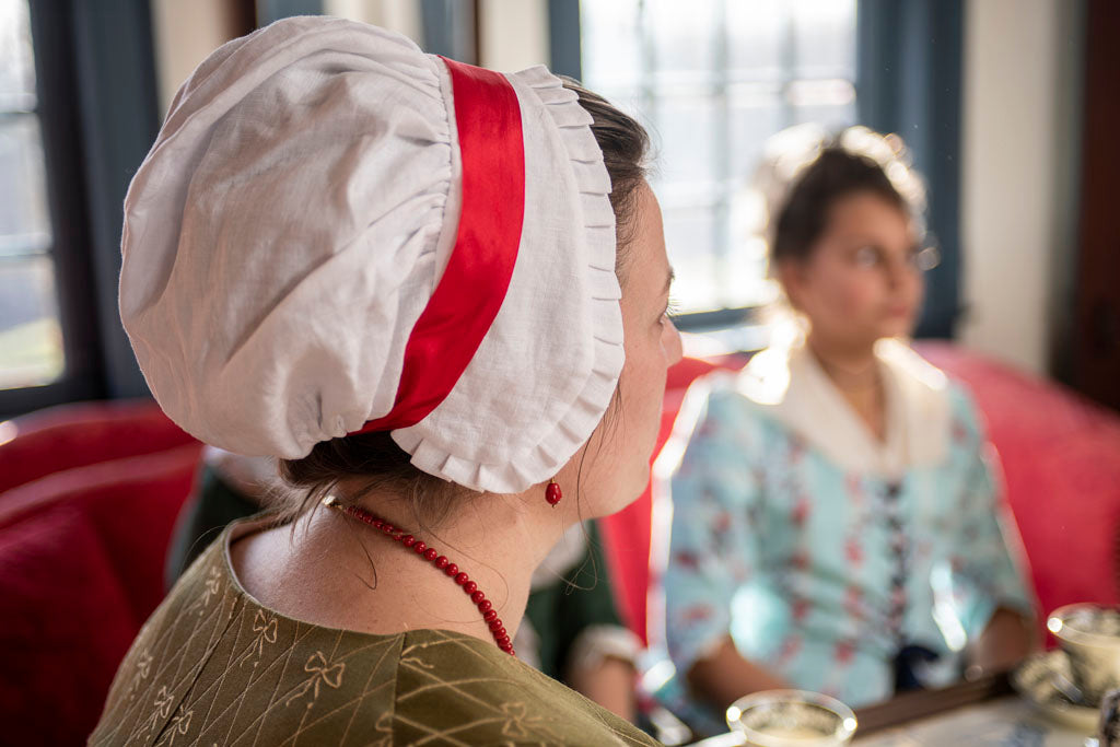 Red Silk Ribbon worn accessorizing 18th Century attire